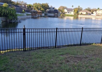 Black_Aluminum_Fence_Gate_Facing_Water